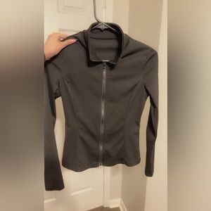 Black form fitting (workout) jacket